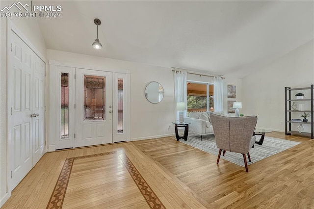 26 Mountain View Rd, Manitou Springs, CO 80829 - foyer featuring lofted ceiling, light wood-type flooring, and baseboards