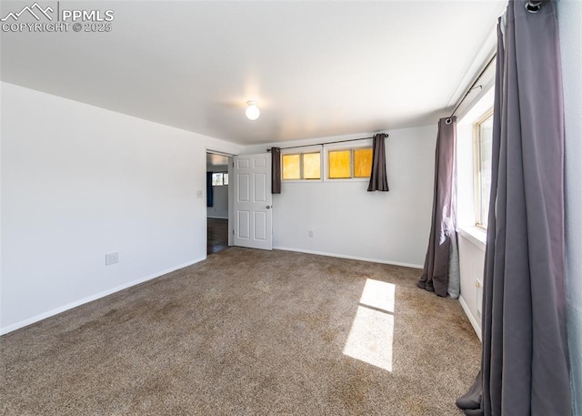 1328 E Las Animas St, Colorado Springs, CO 80910 - empty room with carpet floors and baseboards