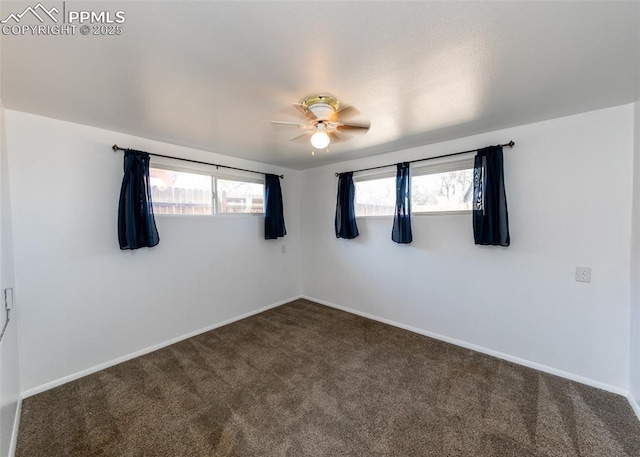 1328 E Las Animas St, Colorado Springs, CO 80910 - empty room featuring baseboards, a ceiling fan, and dark carpet