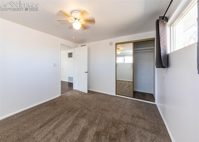 1328 E Las Animas St, Colorado Springs, CO 80910 - unfurnished bedroom featuring baseboards, visible vents, carpet, and a closet