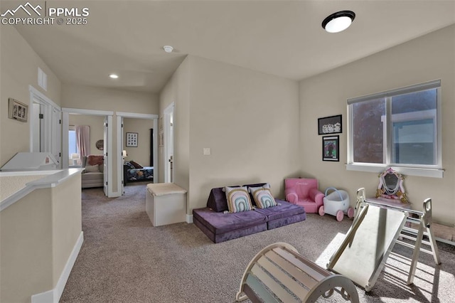 835 Redemption Pt, Colorado Springs, CO 80905 - living room with baseboards, recessed lighting, visible vents, and light colored carpet