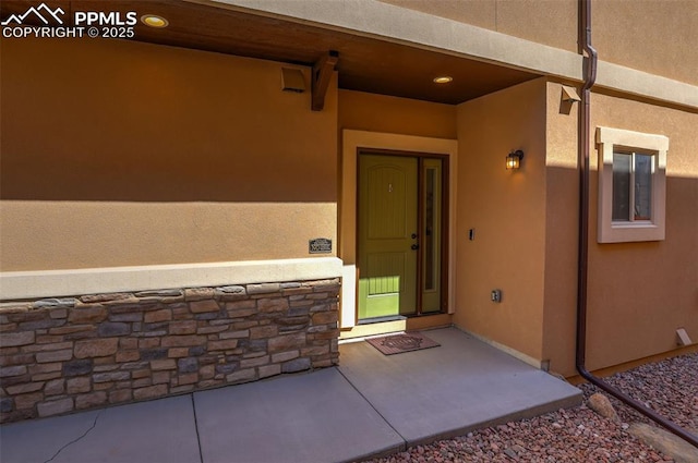 835 Redemption Pt, Colorado Springs, CO 80905 - doorway to property with stucco siding