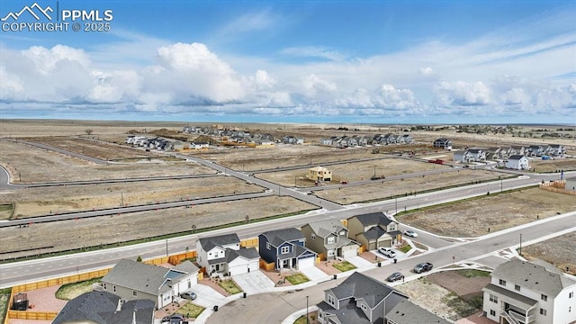 6555 Roundtail Way, Colorado Springs, CO 80925 - drone / aerial view featuring a residential view