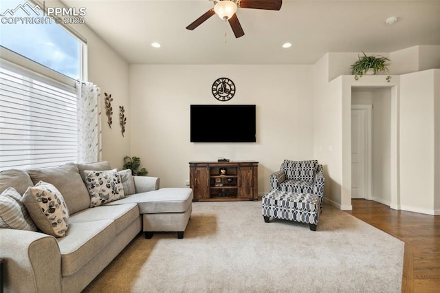 10842 Scenic Brush Dr, Peyton, CO 80831 - living area featuring a ceiling fan, recessed lighting, wood finished floors, and baseboards