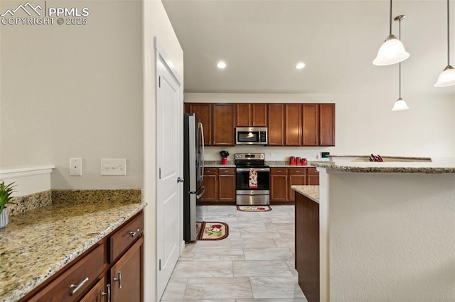 10842 Scenic Brush Dr, Peyton, CO 80831 - kitchen featuring stainless steel appliances, light marble finish floors, light stone counters, decorative light fixtures, and recessed lighting