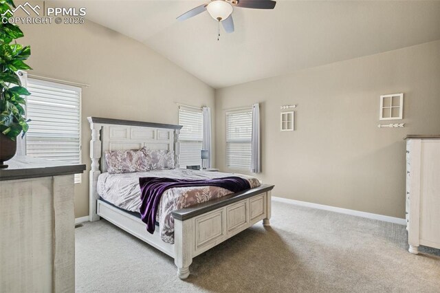 10842 Scenic Brush Dr, Peyton, CO 80831 - bedroom with lofted ceiling, light colored carpet, baseboards, and ceiling fan