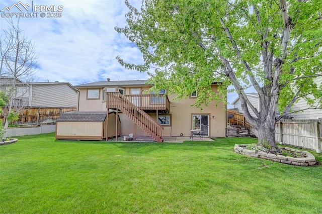 1120 Pipestone Ct, Colorado Springs, CO 80911 - rear view of property with stairway, stucco siding, a deck, a storage unit, and an outbuilding