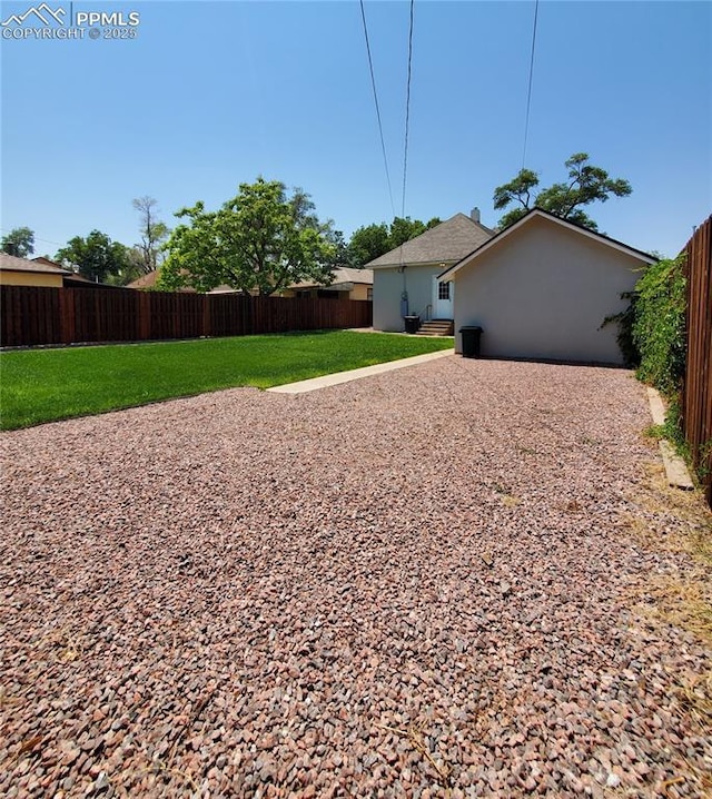 view of yard featuring a fenced backyard