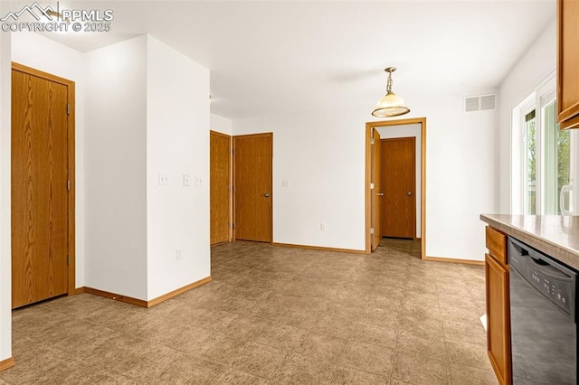 empty room with baseboards