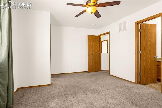 unfurnished bedroom with carpet floors, baseboards, and ceiling fan