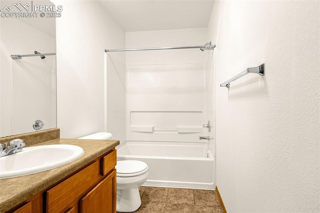 full bath featuring toilet, vanity, bathing tub / shower combination, and baseboards