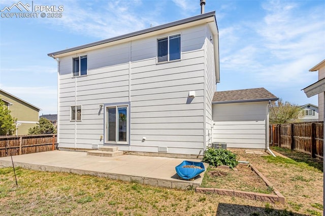 rear view of property featuring a patio and cooling unit