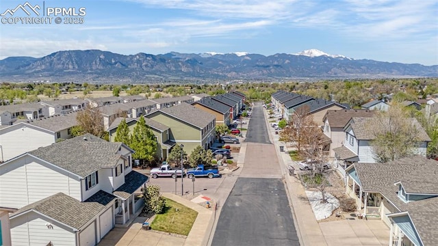 aerial perspective of suburban area featuring a mountainous background