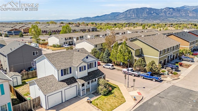 aerial perspective of suburban area featuring mountains