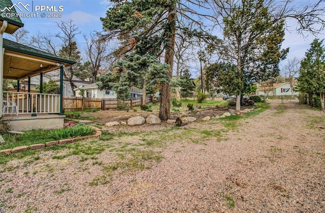 view of yard featuring fence