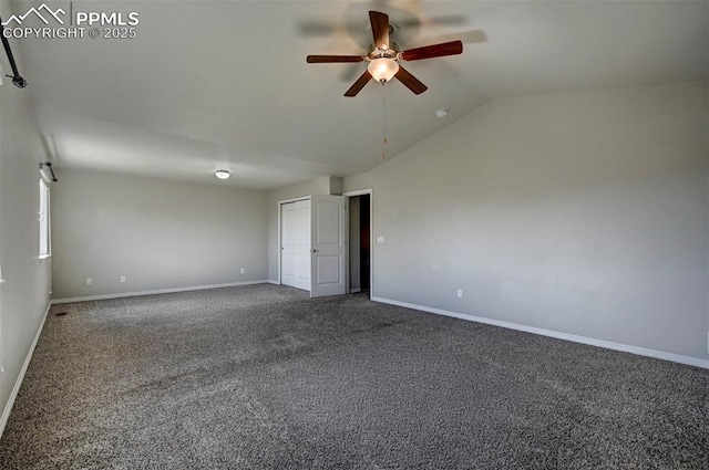 carpeted empty room with baseboards, a ceiling fan, and lofted ceiling