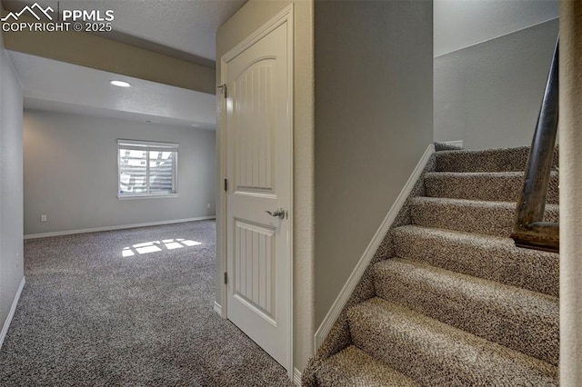stairs featuring carpet, baseboards, and recessed lighting