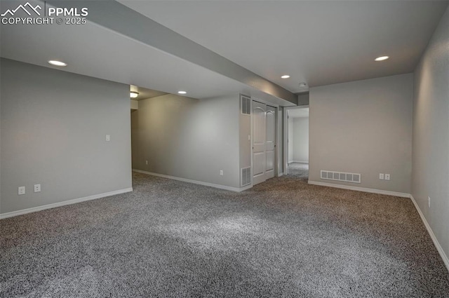finished below grade area with recessed lighting, carpet flooring, and visible vents