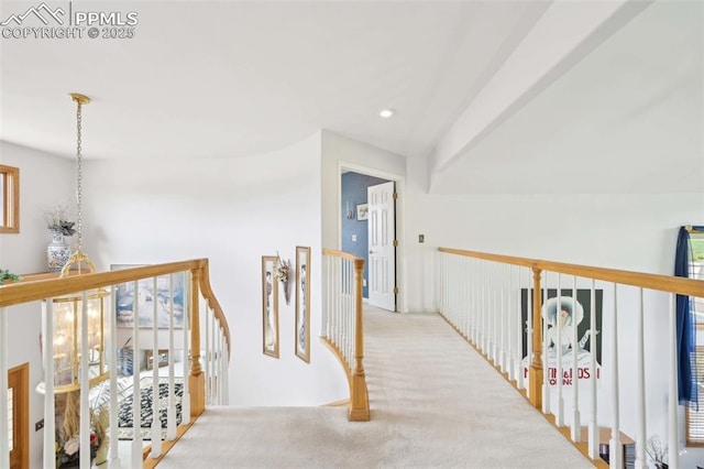 corridor featuring an upstairs landing, carpet flooring, and recessed lighting