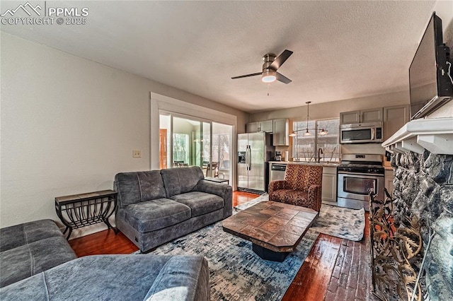 1503 Cheyenne Blvd, Colorado Springs, CO 80906 - living area with a ceiling fan and light wood-type flooring