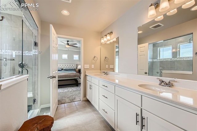 5905 Longford Way, Colorado Springs, CO 80927 - ensuite bathroom featuring a stall shower, tile patterned flooring, visible vents, and a sink