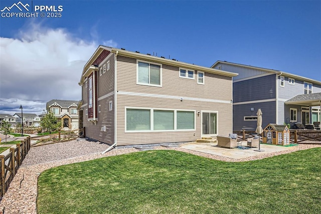 5905 Longford Way, Colorado Springs, CO 80927 - rear view of house with fence, a patio, outdoor lounge area, and a lawn