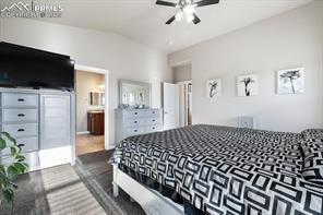 10150 Bracknell Pl, Peyton, CO 80831 - bedroom with a ceiling fan and ensuite bath
