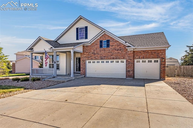 12383 Pine Valley Cir, Peyton, CO 80831 - traditional home with fence, concrete driveway, covered porch, brick siding, and an attached garage