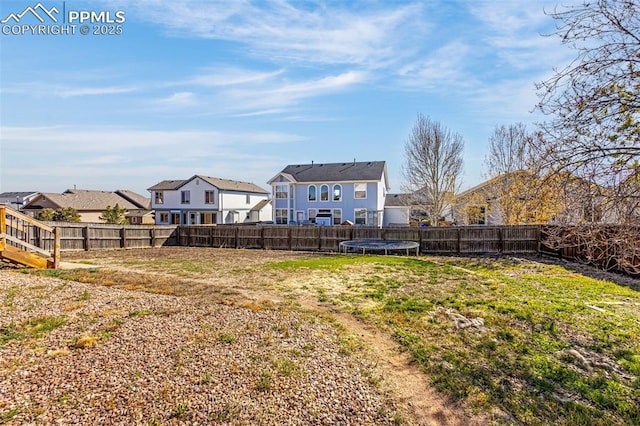 12383 Pine Valley Cir, Peyton, CO 80831 - view of yard featuring a residential view and a trampoline