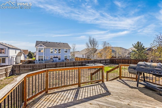 12383 Pine Valley Cir, Peyton, CO 80831 - wooden terrace featuring a residential view and a fenced backyard