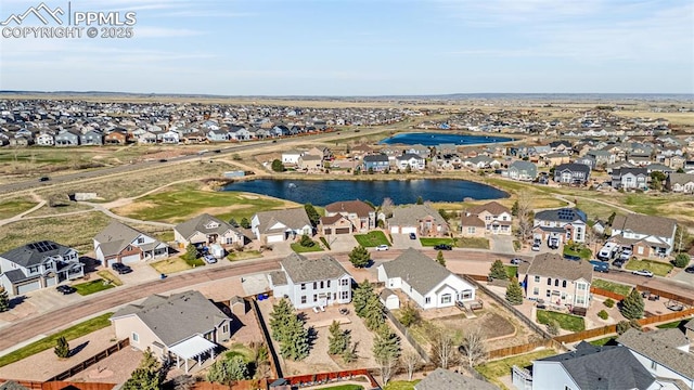 12383 Pine Valley Cir, Peyton, CO 80831 - aerial perspective of suburban area with a nearby body of water