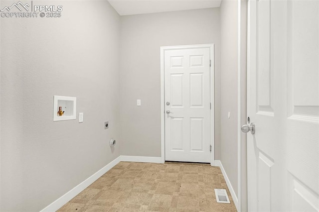 12383 Pine Valley Cir, Peyton, CO 80831 - clothes washing area with hookup for an electric dryer, hookup for a washing machine, baseboards, and light floors
