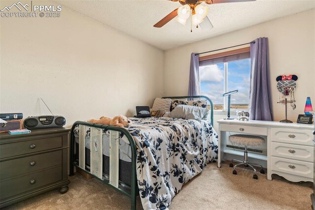 17090 Forest Green Way, Elbert, CO 80106 - carpeted bedroom with a ceiling fan and lofted ceiling