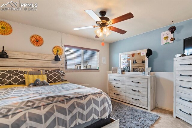 17090 Forest Green Way, Elbert, CO 80106 - bedroom featuring light carpet and ceiling fan
