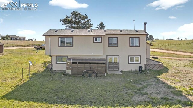 17090 Forest Green Way, Elbert, CO 80106 - rear view of property with stucco siding, french doors, and a view of countryside