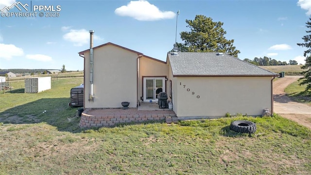 17090 Forest Green Way, Elbert, CO 80106 - rear view of house featuring stucco siding and a patio