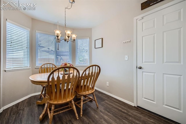 6640 Oakwood Blvd, Colorado Springs, CO 80923 - dining room with a chandelier, dark wood finished floors, and baseboards