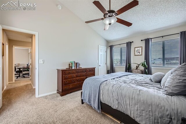6640 Oakwood Blvd, Colorado Springs, CO 80923 - bedroom with lofted ceiling, light colored carpet, a textured ceiling, a ceiling fan, and baseboards