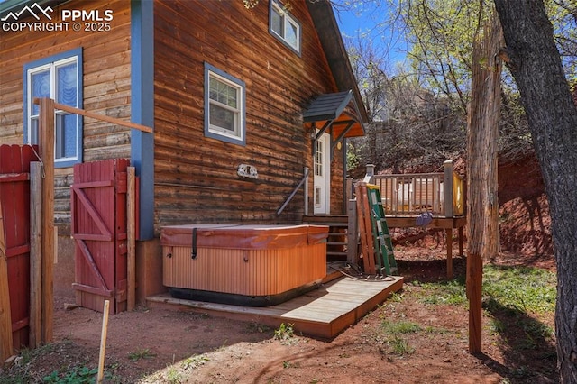 18 Fountain Pl, Manitou Springs, CO 80829 - view of home's exterior with a hot tub and a wooden deck