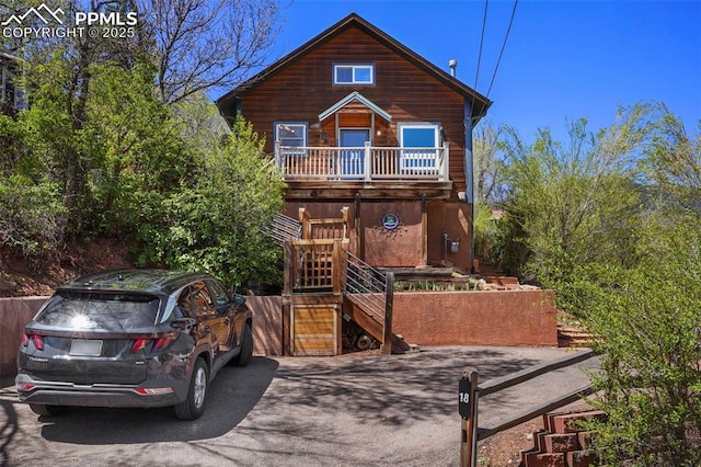 18 Fountain Pl, Manitou Springs, CO 80829 - rustic home with stairway