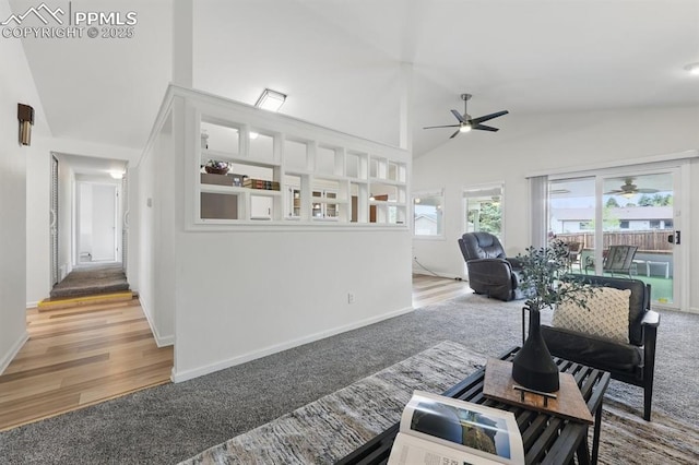 5050 Bunk House Ln, Colorado Springs, CO 80917 - living area featuring a ceiling fan, carpet floors, lofted ceiling, baseboards, and wood finished floors