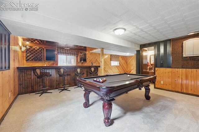 5050 Bunk House Ln, Colorado Springs, CO 80917 - game room with wooden walls, a bar, carpet floors, and billiards table