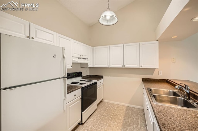 kitchen with a sink, freestanding refrigerator, white cabinetry, under cabinet range hood, and range with electric stovetop