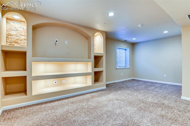 2610 Plumtree Grv, Colorado Springs, CO 80907 - carpeted empty room with built in shelves, baseboards, and recessed lighting