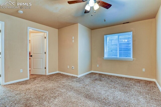 2610 Plumtree Grv, Colorado Springs, CO 80907 - empty room with ceiling fan, carpet flooring, baseboards, and a smoke detector