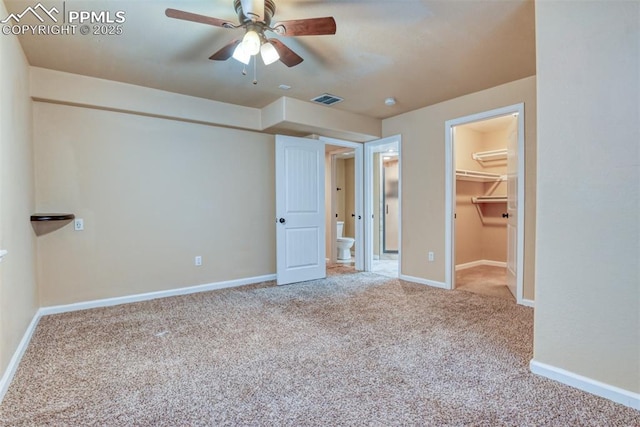 2610 Plumtree Grv, Colorado Springs, CO 80907 - unfurnished bedroom with carpet, a spacious closet, and baseboards
