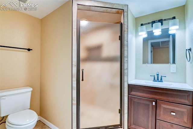 2610 Plumtree Grv, Colorado Springs, CO 80907 - full bathroom featuring a shower stall, vanity, and toilet