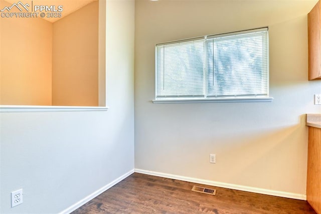 2610 Plumtree Grv, Colorado Springs, CO 80907 - spare room featuring baseboards and wood finished floors
