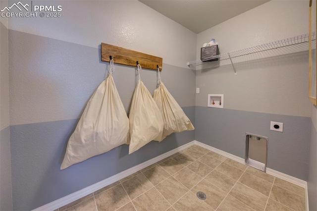 washroom featuring laundry area, tile patterned flooring, electric dryer hookup, washer hookup, and baseboards