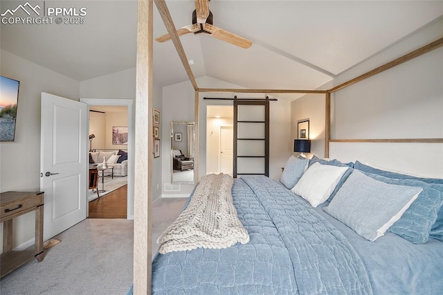 4932 Sand Canyon Trl, Colorado Springs, CO 80924 - bedroom featuring lofted ceiling, a barn door, carpet flooring, and a ceiling fan